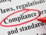 Image of the word compliance circled
